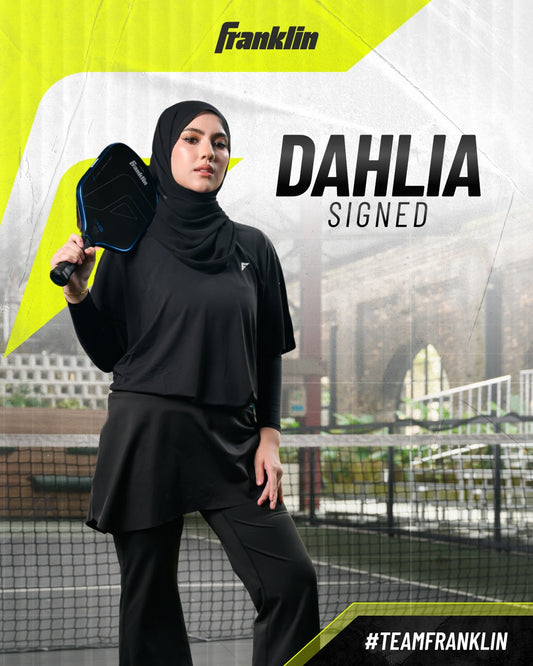 Dahlia Rizal poses with a Franklin pickleball paddle following her signing to #TeamFranklin.