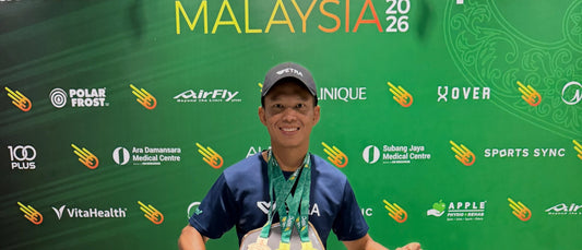 Ashaari Zainal on the WPC Malaysia 2026 podium wearing his gold medals