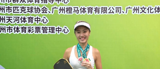 Agnes Fan with a medal in Guangzhou