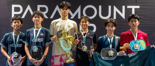 Paramount Cup junior division champions on the podium with the trophy