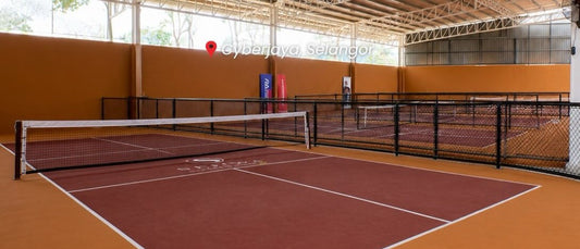 An indoor pickleball court at Sejiwa Social Club.