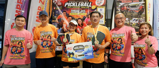 Category 2 (DUPR 2.99 and below) champion and 2nd runner-up pairs with their medals and prize boards (RM400 and RM250) at the Pickleball Charity Tournament in Subang Jaya.