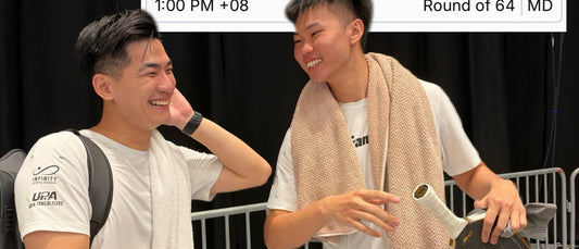 Jimmy Liong and Loh Shi Sheng, with the Round of 64 scoreboard.
