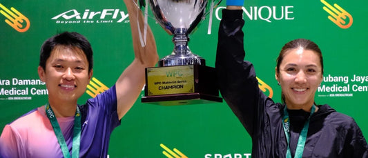 Delia Arnold and Marcus Low celebrate their MX 35+ 5.0 gold at WPC Malaysia
