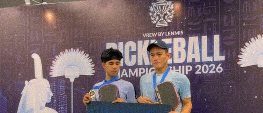 Syed Uzair and Aaiman Hamdan on the podium after their Men's Doubles 19+ Open win.